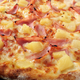 Illustration for article titled Pineapple on pizza is delicious and I will gladly die on this hillem/em